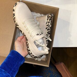 APL Cream and Black Athletic Shoes